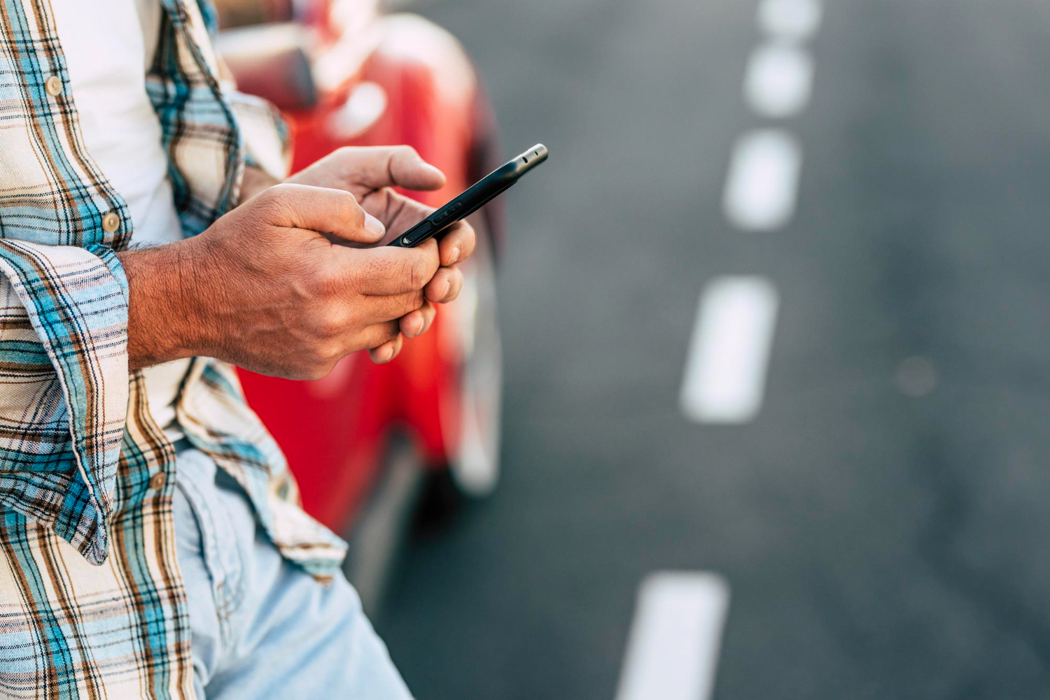 man-holding-phone-hands-texting-message-using-mobile-apps-checking-social-media-applications-new-black-smartphone-working-playing-game-cellphone-male-customer-gadget-close-up-view